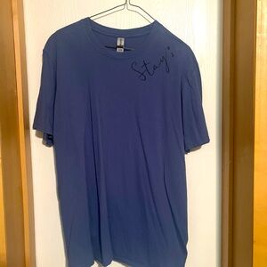 T-shirt with stay written on top side
